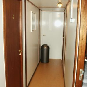 Family On Boat Cabin